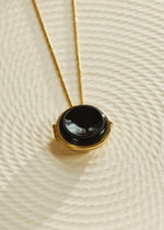 Load image into Gallery viewer, Carved Onyx Locket in 10k Yellow Gold, 20”
