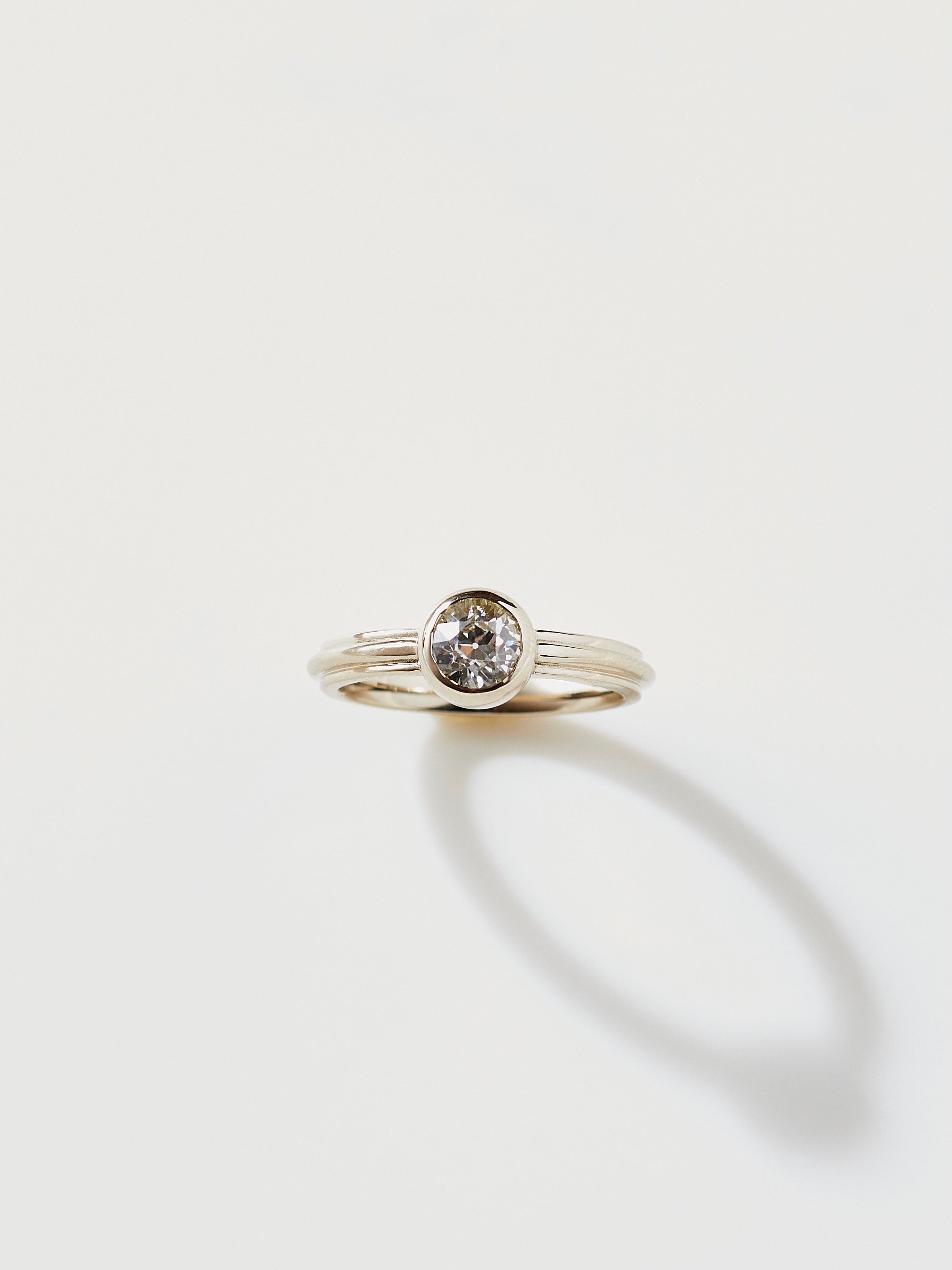 Narrow Column Solitaire in 18k White Gold with .63ct Old Euro Diamond, Size 6